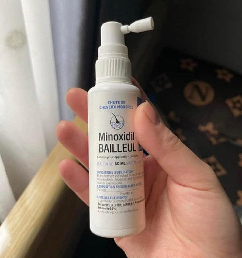 thuoc minoxidil 2 1